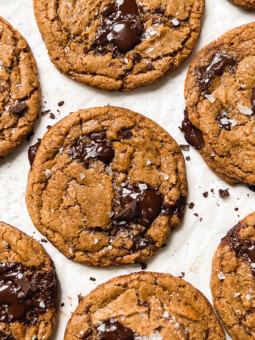vegan chocolate chip cookies on parchment paper