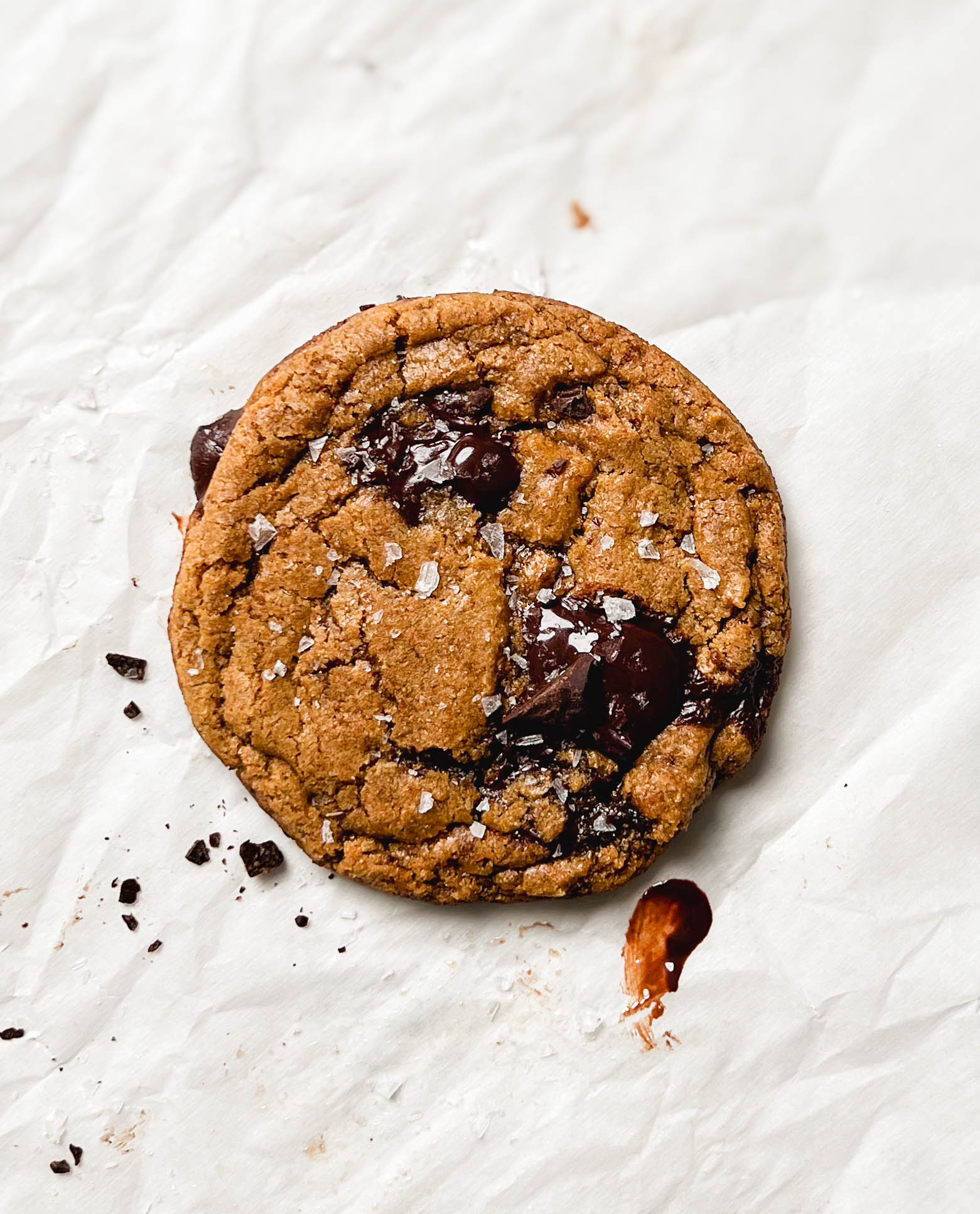 vegan chocolate chip cookies on parchment paper