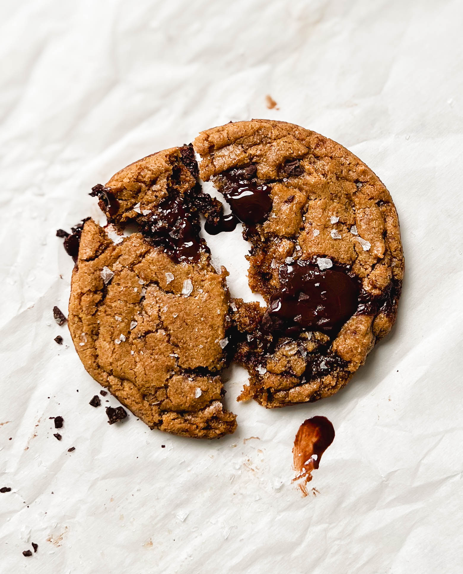 vegan chocolate chip cookies on parchment paper