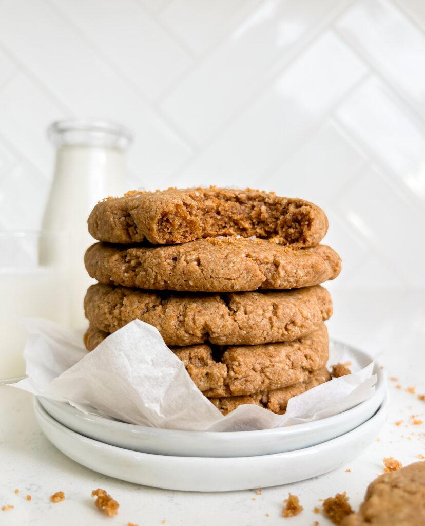 chewy vegan chai cookies stacked on top of a white plate