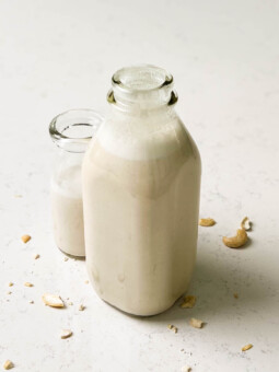 cashew milk in a glass bottle