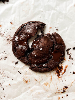 vegan double chocolate chip cookies on parchment paper