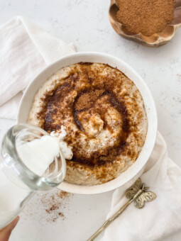 creamy vanilla oatmeal topped with cinnamon sugar and cashew milk