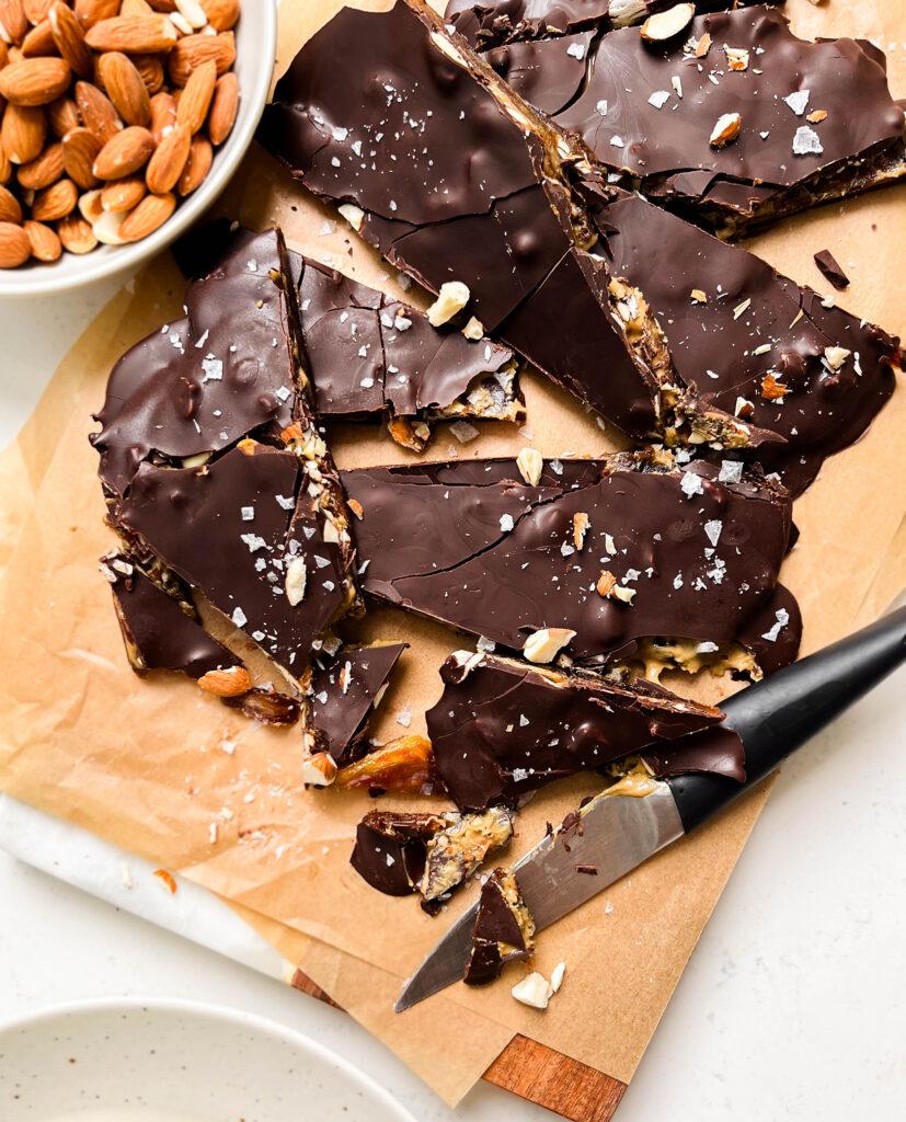 chocolate date bark on unbleached parchment paper