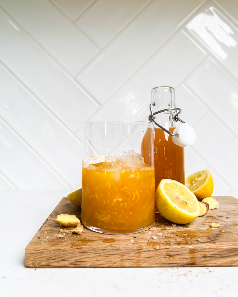 glass or morning tonic on cutting board