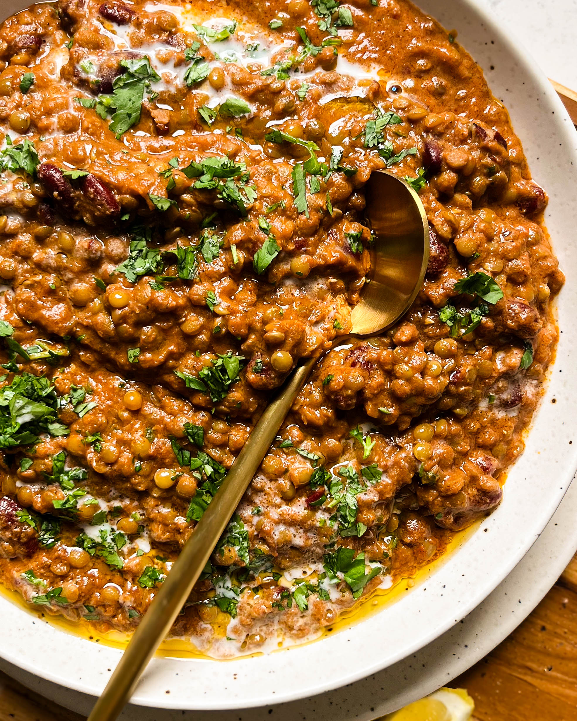 vegan dal makhani in a speckled bowl