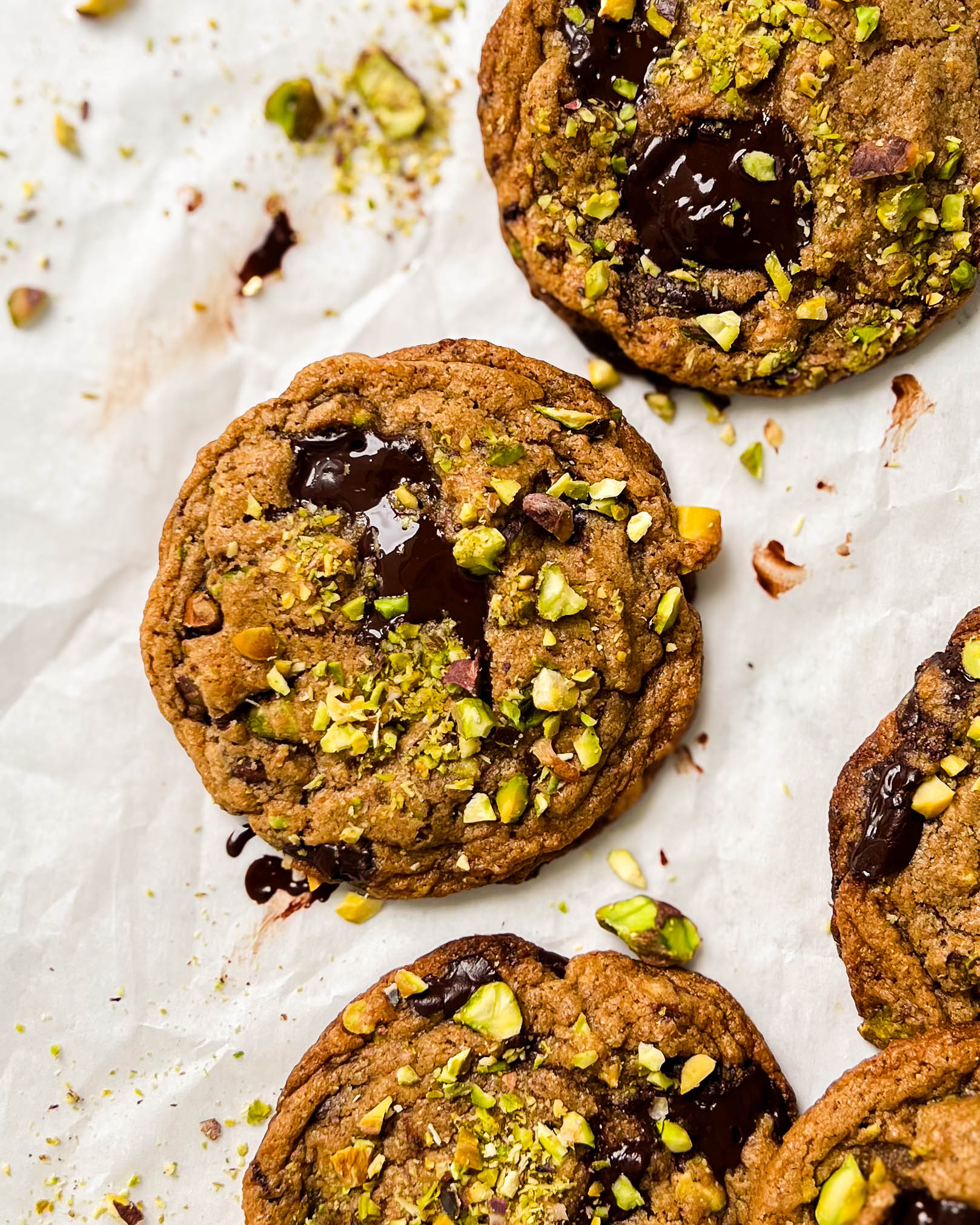 pistachio cookies on parchment paper