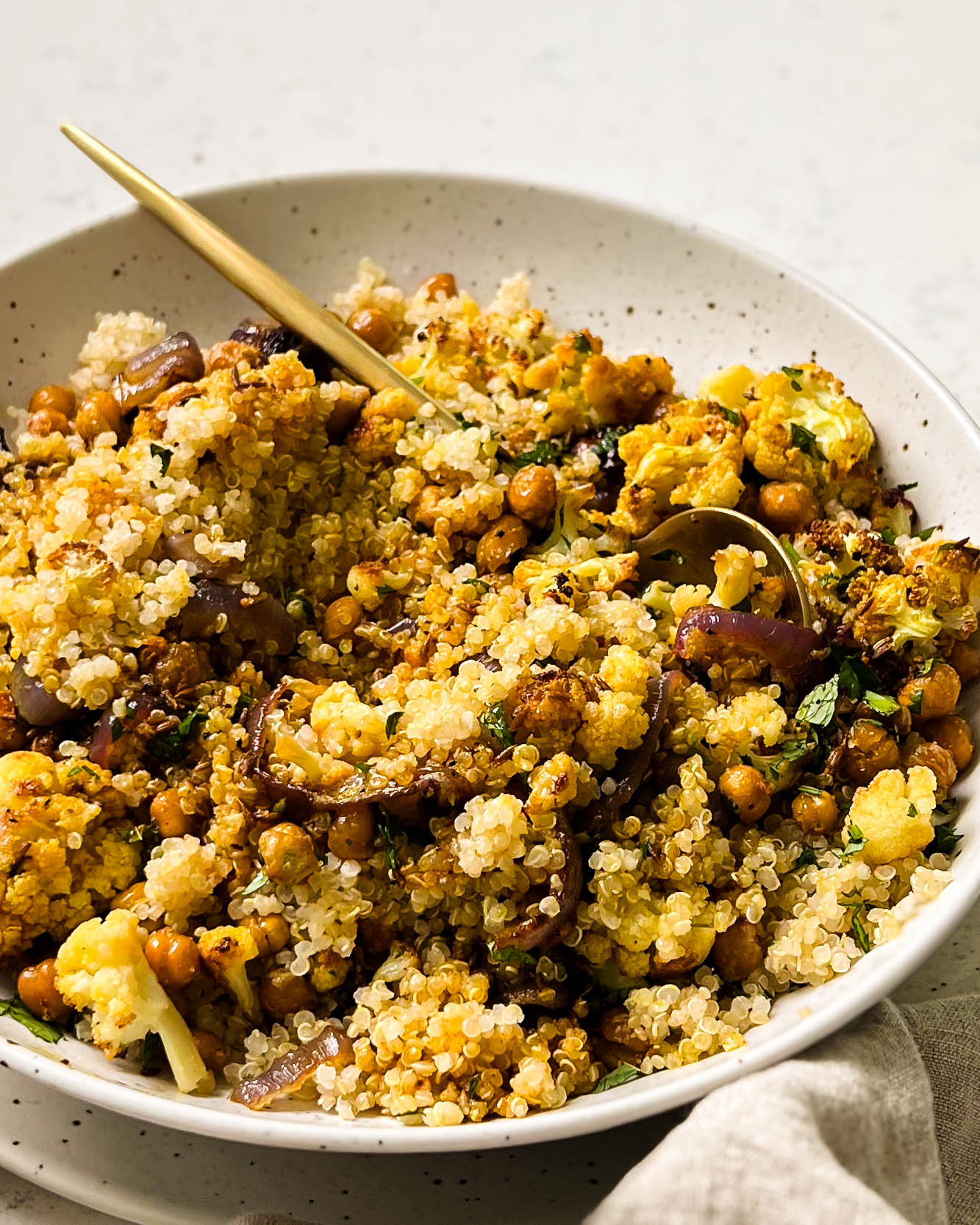 cauliflower salad in a white bowl