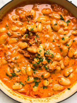spicy tomato butter beans in a pan