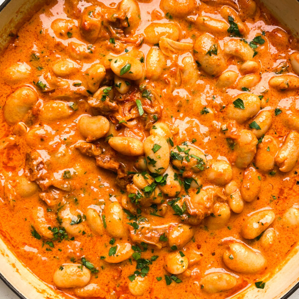 spicy tomato butter beans in a pan