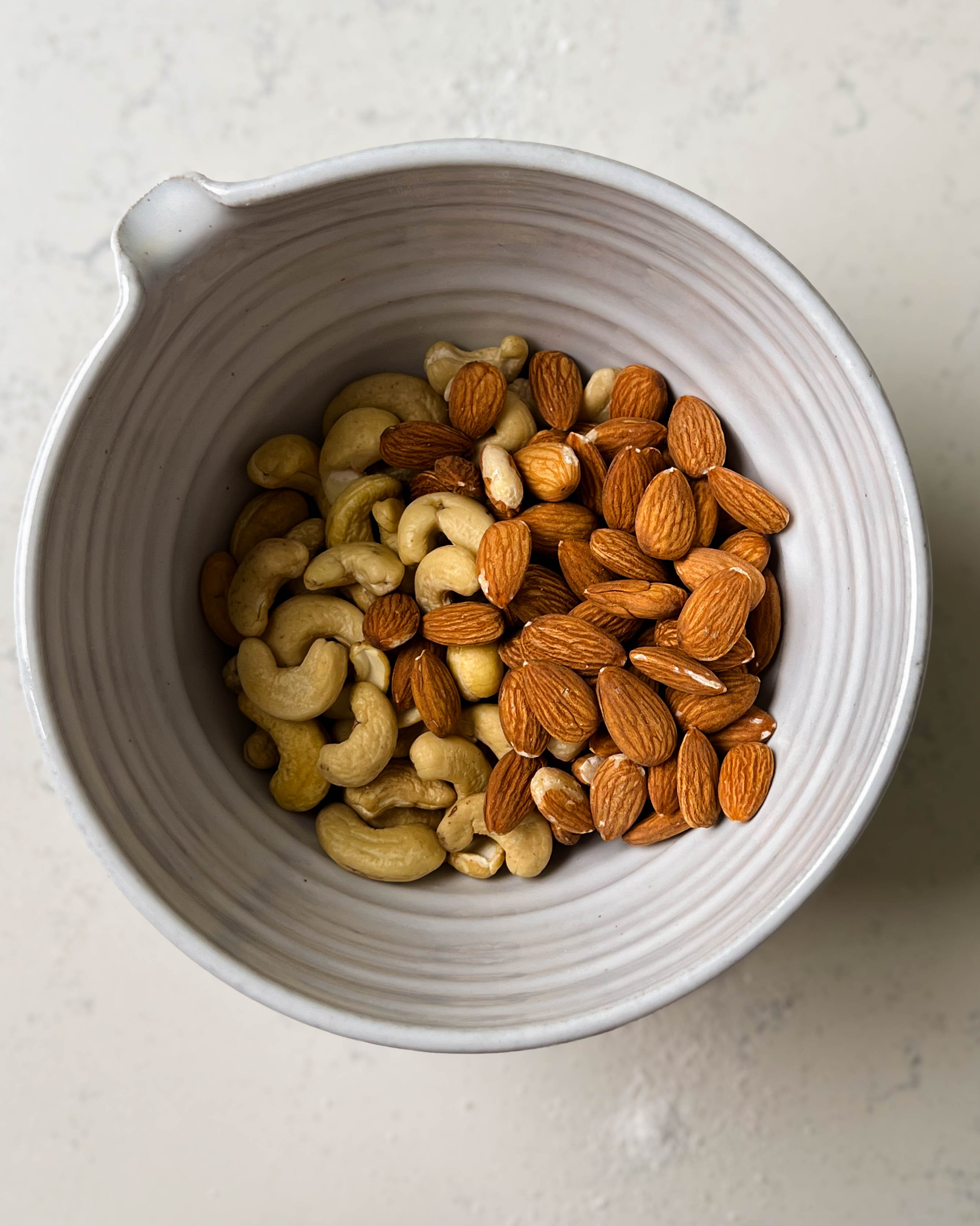 almonds and cashews in a bowl