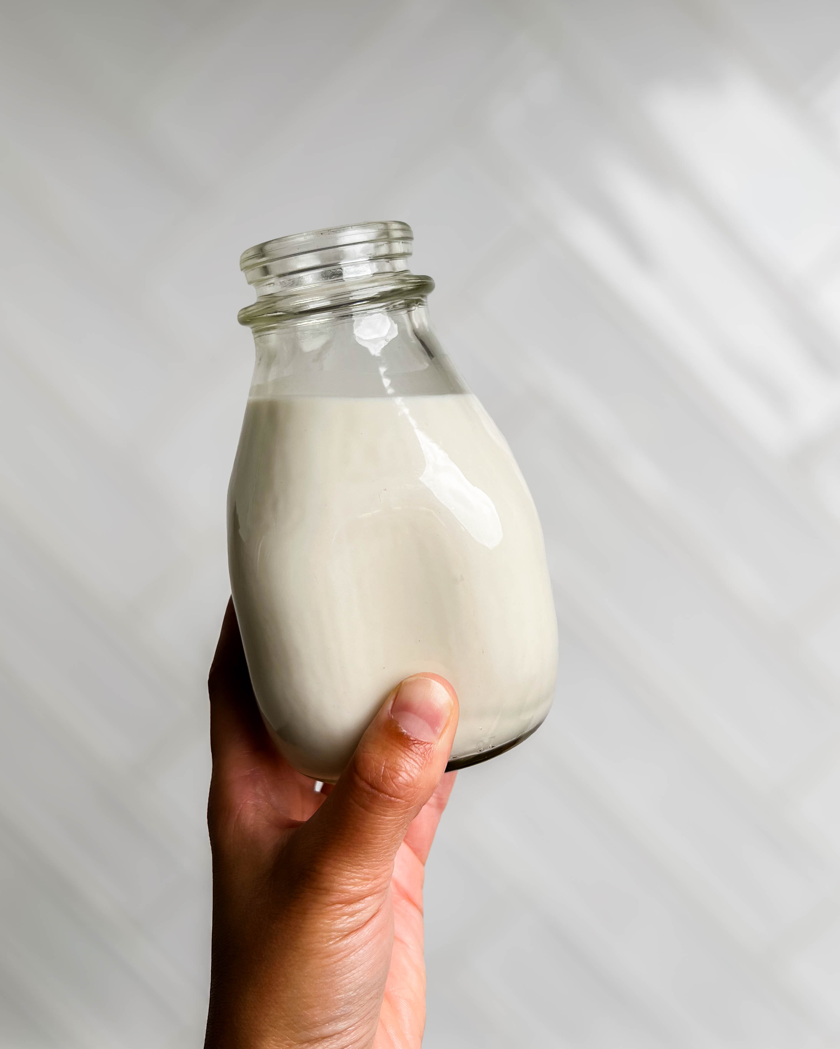 homemade nut milk in a glass jar