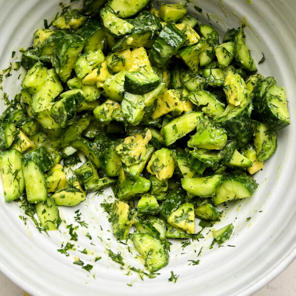 smashed cucumber avocado salad in a bowl