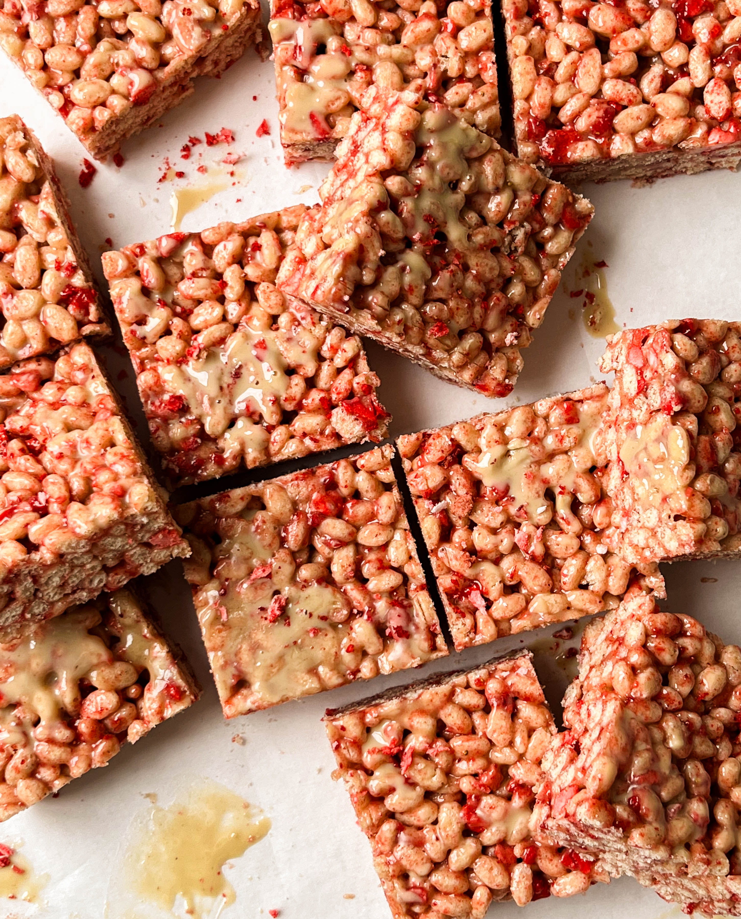 strawberry rice krispie treats on parchment paper